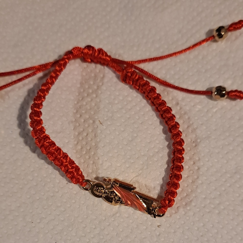 Vibrant Red Braided Bracelet with Gold Details